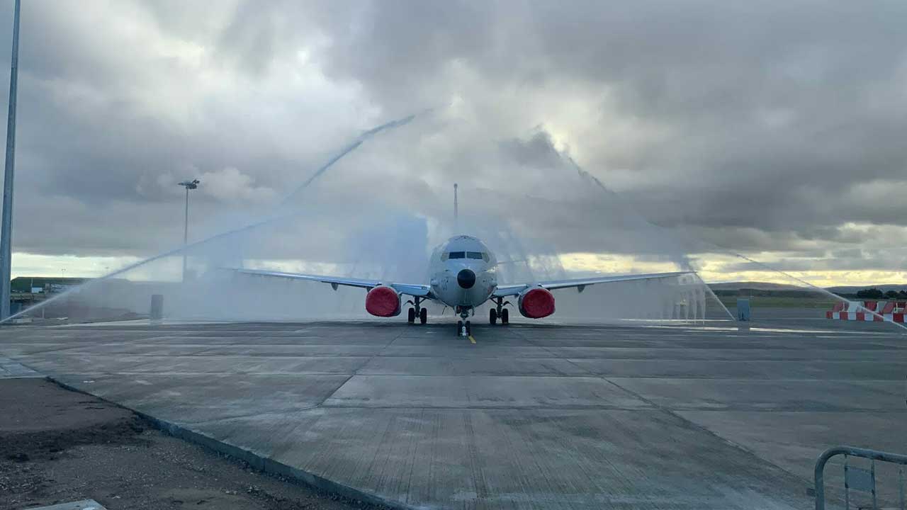 Commercial airplane parked on the runway