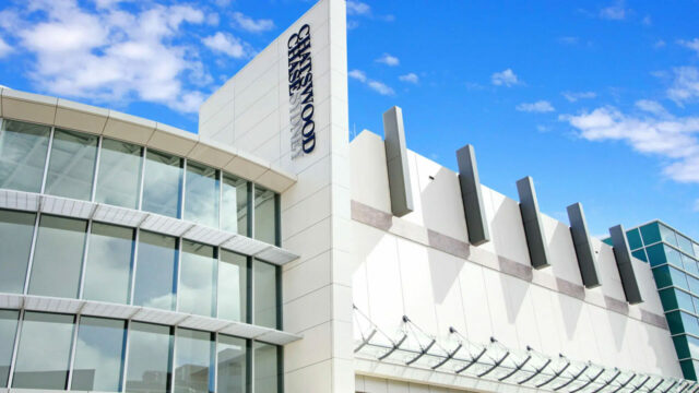Exterior of Chatswood Chase retail center with glass windows
