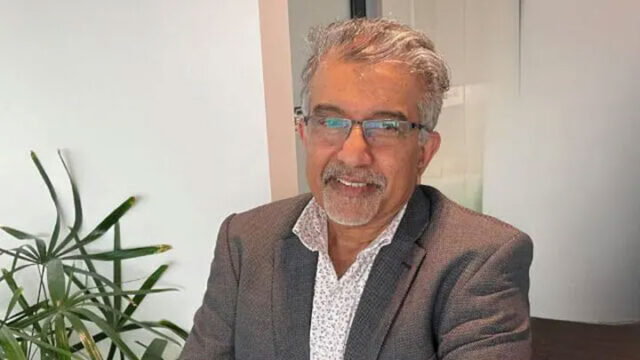 Headshot of Sam Gunasekera