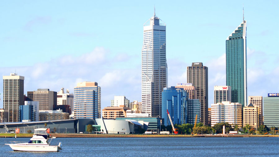 Skyline view of Perth with buildings and skyscrapers along the coast